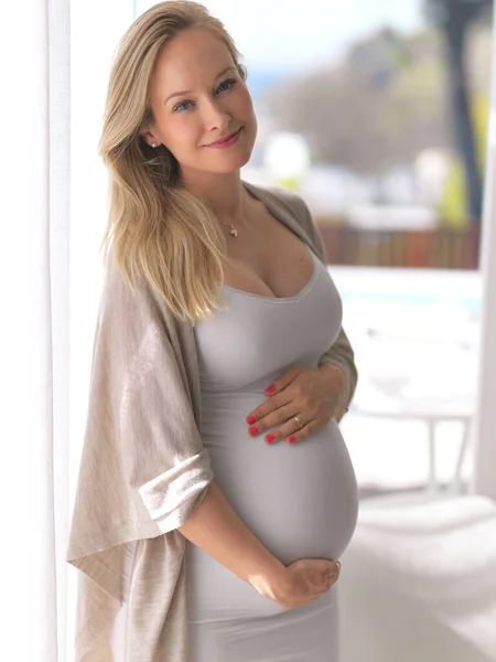 depositphotos_545822656-stock-photo-pregnancy-looks-good-on-her